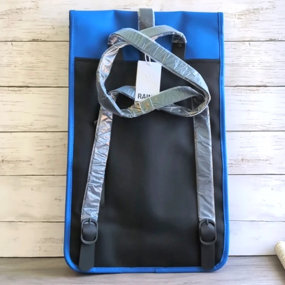 NWT RAINS Blue Waterproof Backpack Laptop Sleeve Sleek Adjustable Unisex